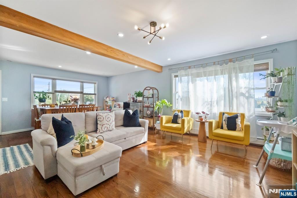 340 Marsan Drive Carlstadt, NJ 07072 - Photo 31 of 50 a living room with furniture and a large window
