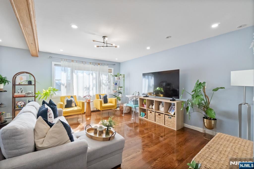 340 Marsan Drive Carlstadt, NJ 07072 - Photo 5 of 50 a living room with furniture and a window
