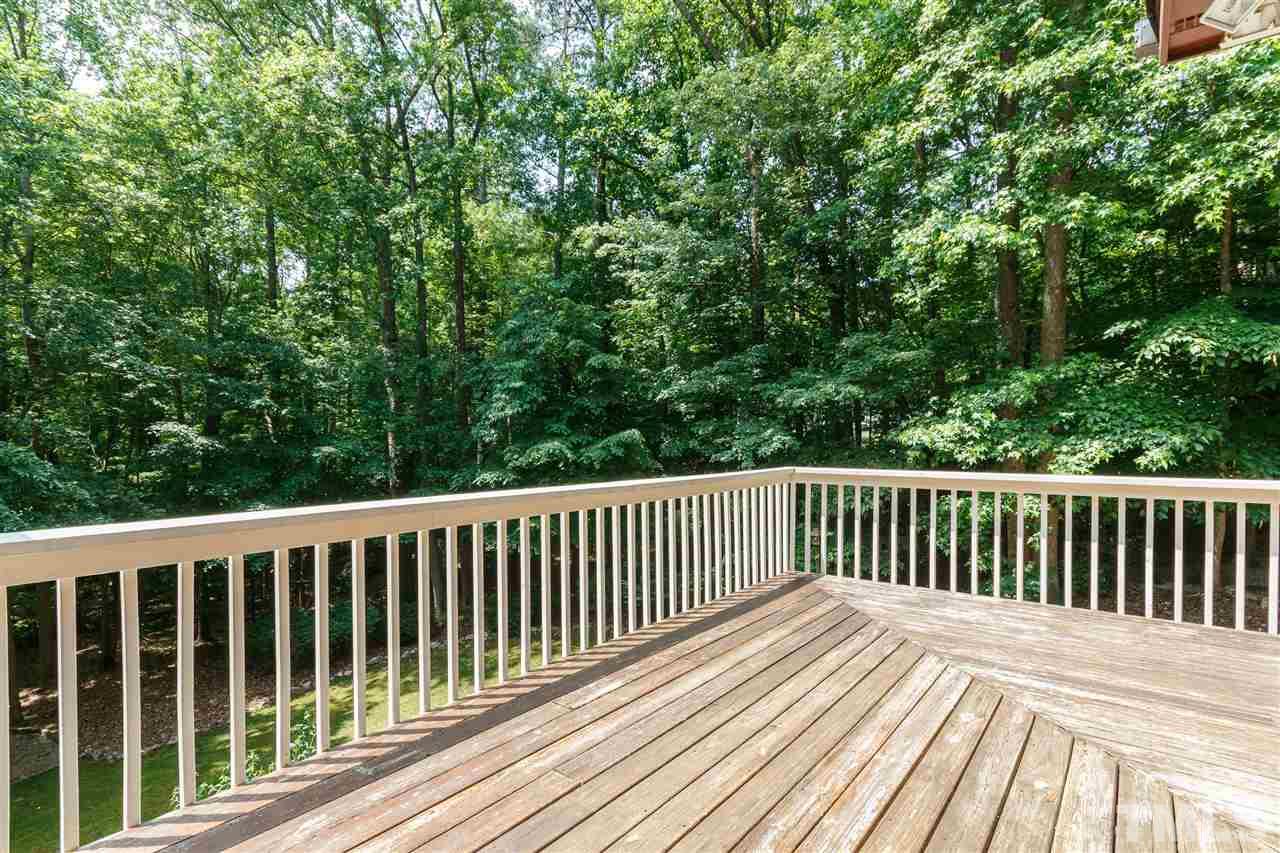 11604 Black Horse Run Raleigh, NC 27613 - Photo 12 of 29 a view of balcony with wooden floor and fence