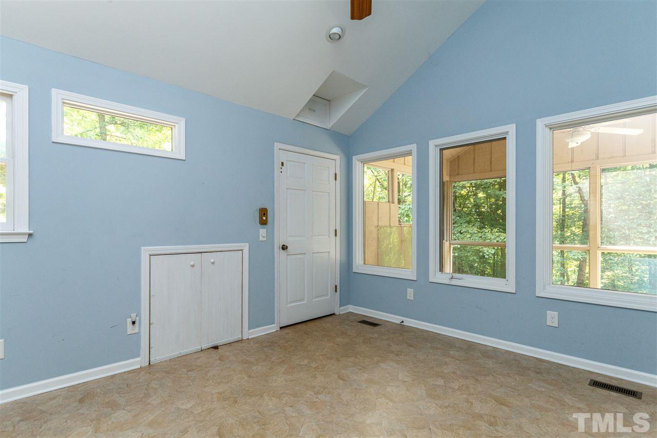 11604 Black Horse Run Raleigh, NC 27613 - Photo 13 of 29 an empty room with windows