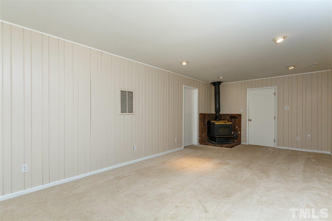 11604 Black Horse Run Raleigh, NC 27613 - Photo 16 of 29 a view of an empty room with furniture