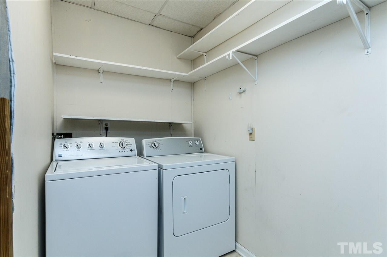11604 Black Horse Run Raleigh, NC 27613 - Photo 20 of 29 a utility room with dryer and washer