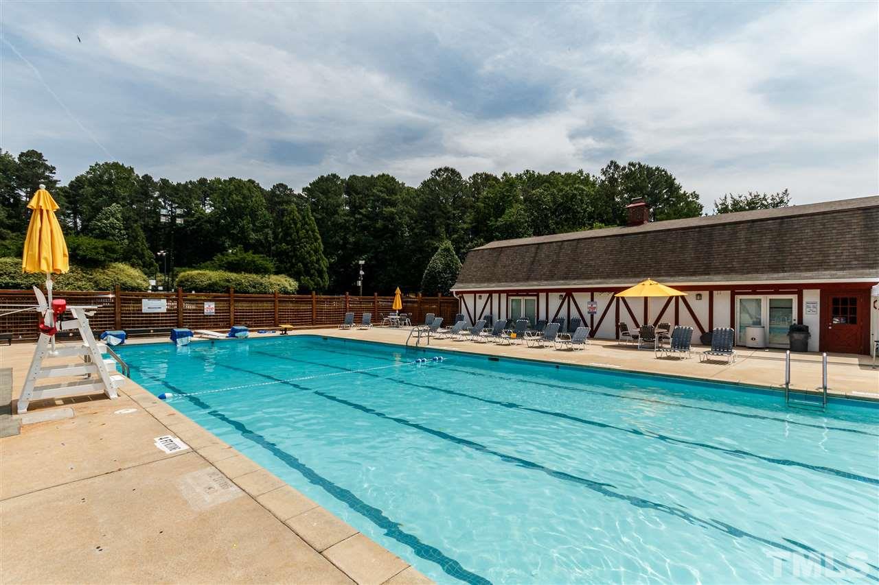 11604 Black Horse Run Raleigh, NC 27613 - Photo 27 of 29 a view of a garden with houses