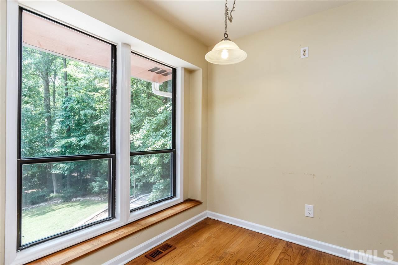 11604 Black Horse Run Raleigh, NC 27613 - Photo 9 of 29 a view of room with window and ceiling fan