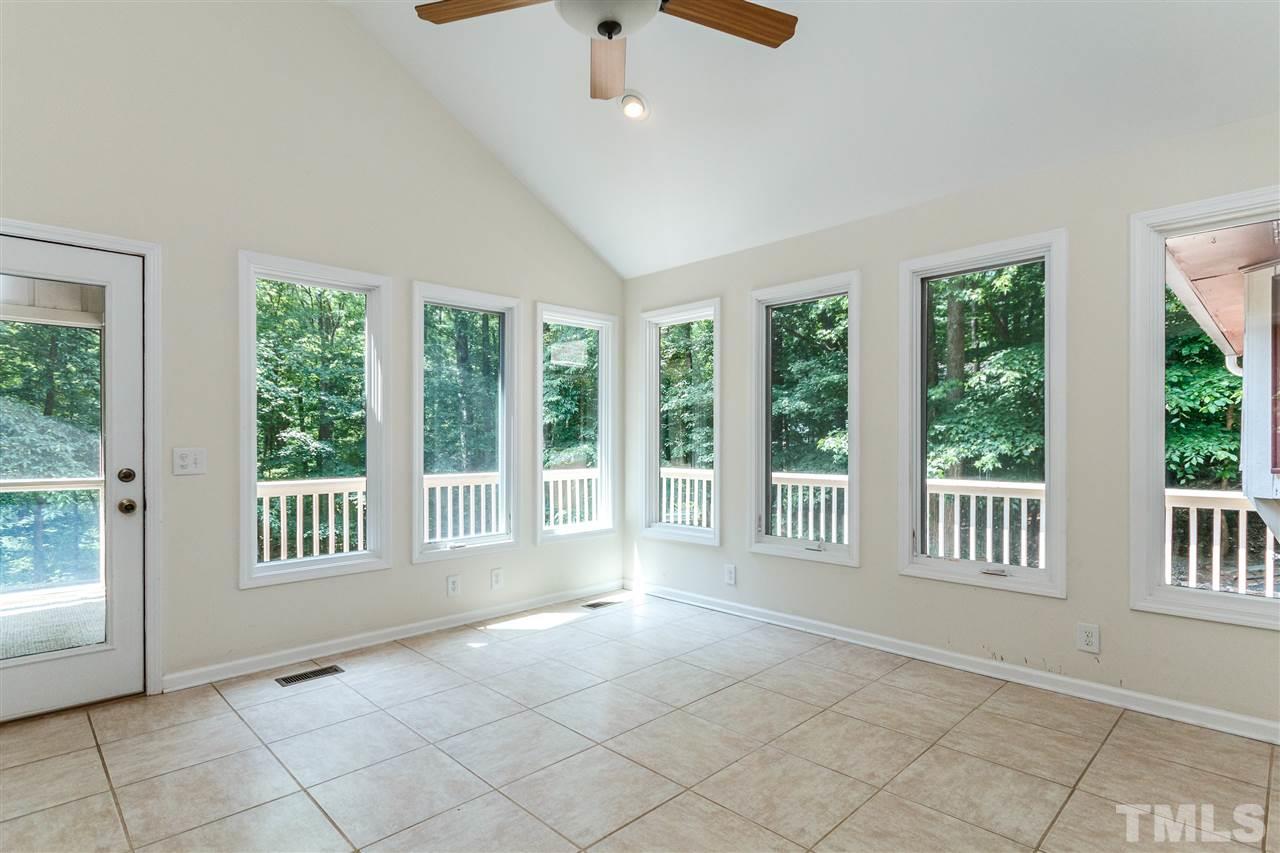 11604 Black Horse Run Raleigh, NC 27613 - Photo 10 of 29 a view of an empty room with a window