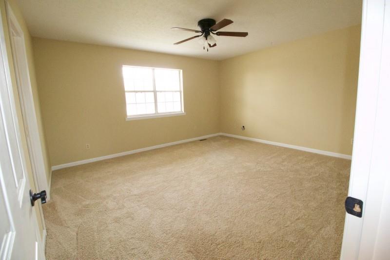 150 Redbud Road Red Boiling Springs, TN 37150 - Photo 7 of 15 a view of room with a ceiling fan and window