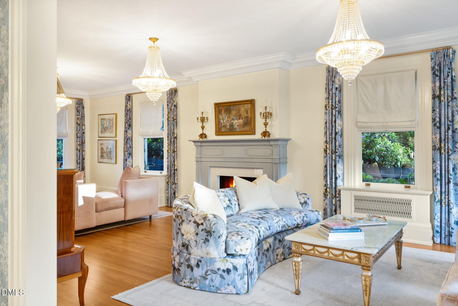 516 North Blount Street Raleigh, NC 27604 - Photo 10 of 45 a living room with furniture and a chandelier