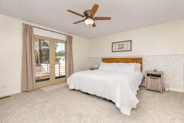 a bathroom with a sink double vanity and a mirror