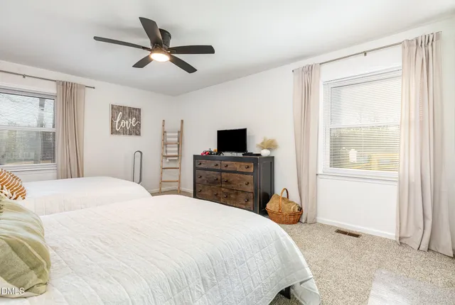 a view of a building from a big yard