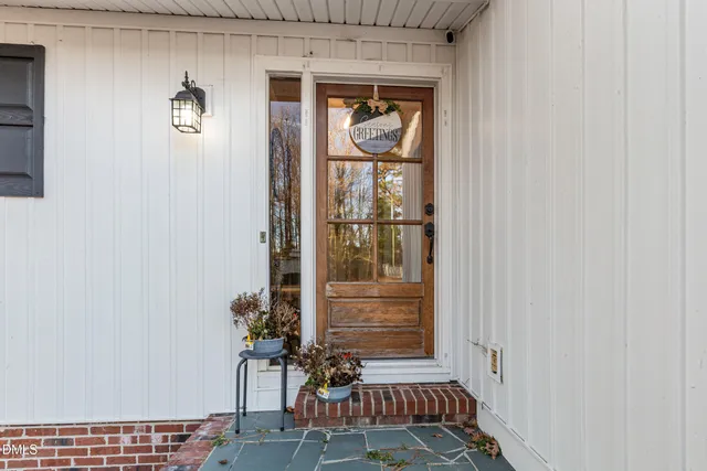 a bathroom with a mirror and a sink