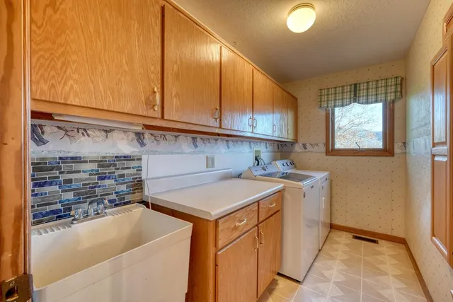 a view of a house with porch and wooden floor