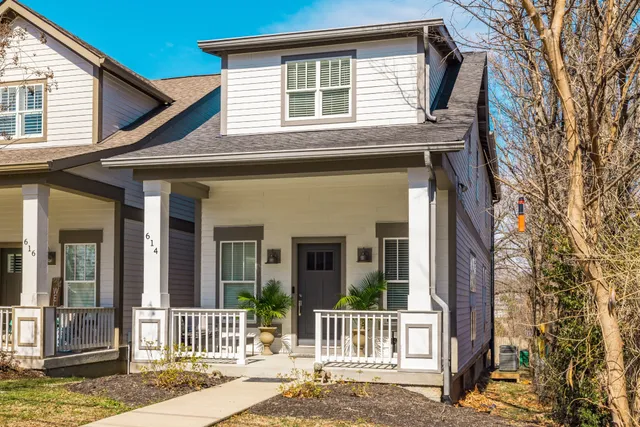 an empty room with wooden floor and closet