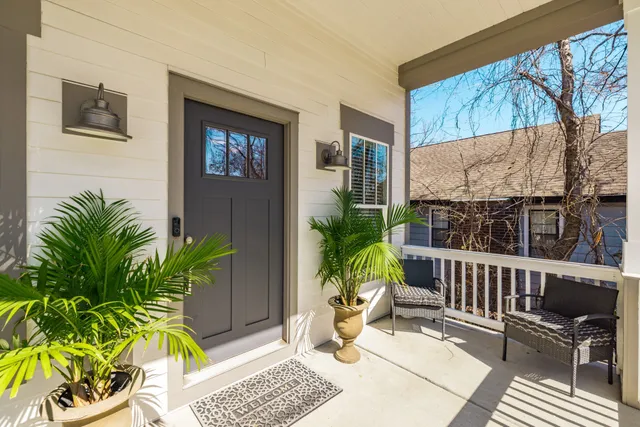 a view of a livingroom with a furniture and wooden floor