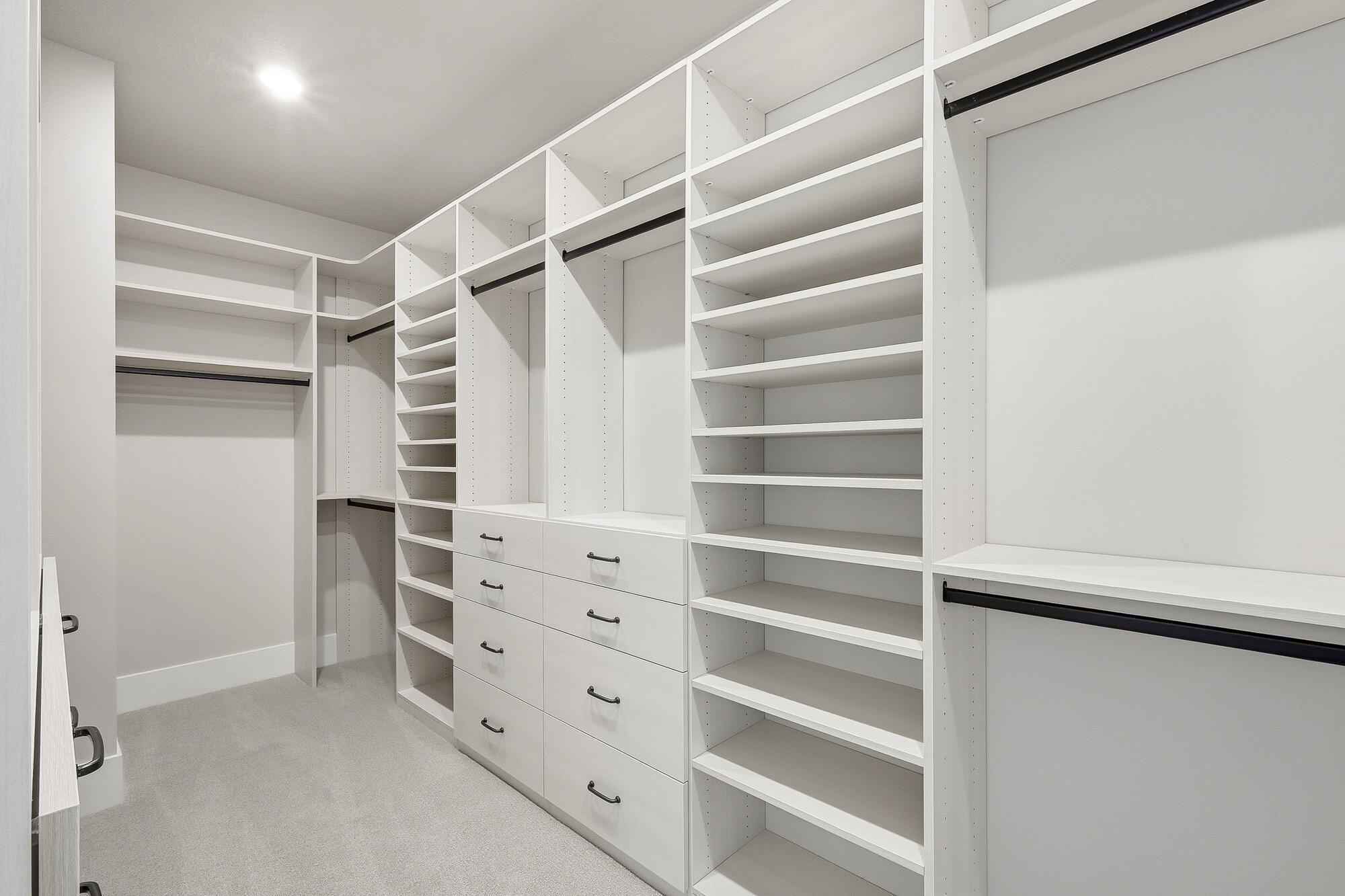 1852 South Hidden Canyon Road Cedar City, UT 84720 - Photo 28 of 79 A thoughtfully designed custom closet system provides abundant hanging space, shelving, and drawers to keep everything organized and within easy reach.