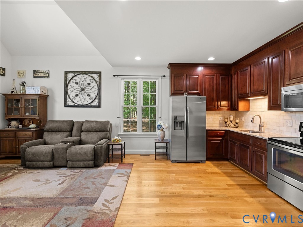 12713 Erinton Terrace Chesterfield, VA 23838 - Photo 28 of 79 Inlaw suite with kitchenette and living room.
