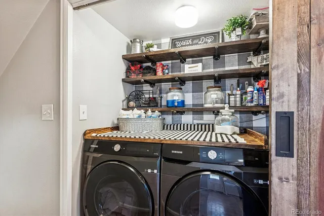 a locker room with furniture and workspace