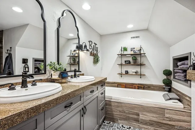 a bathroom with a sink and a shower