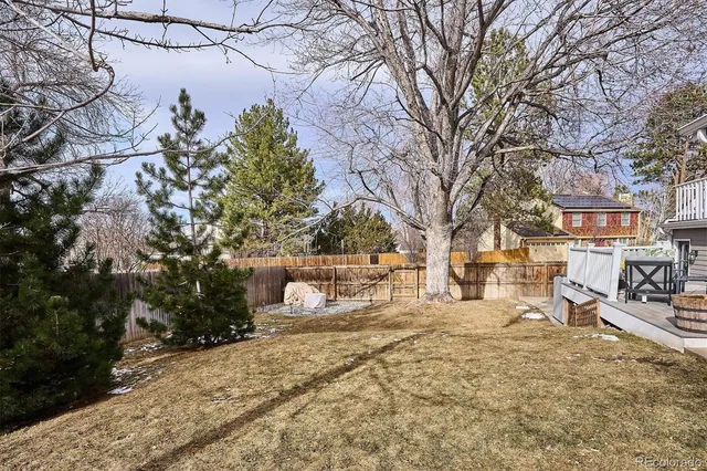 a view of balcony with furniture