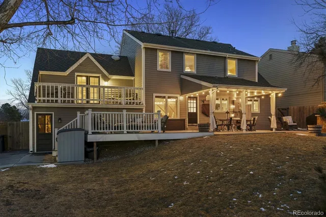 a view of a house with a yard balcony