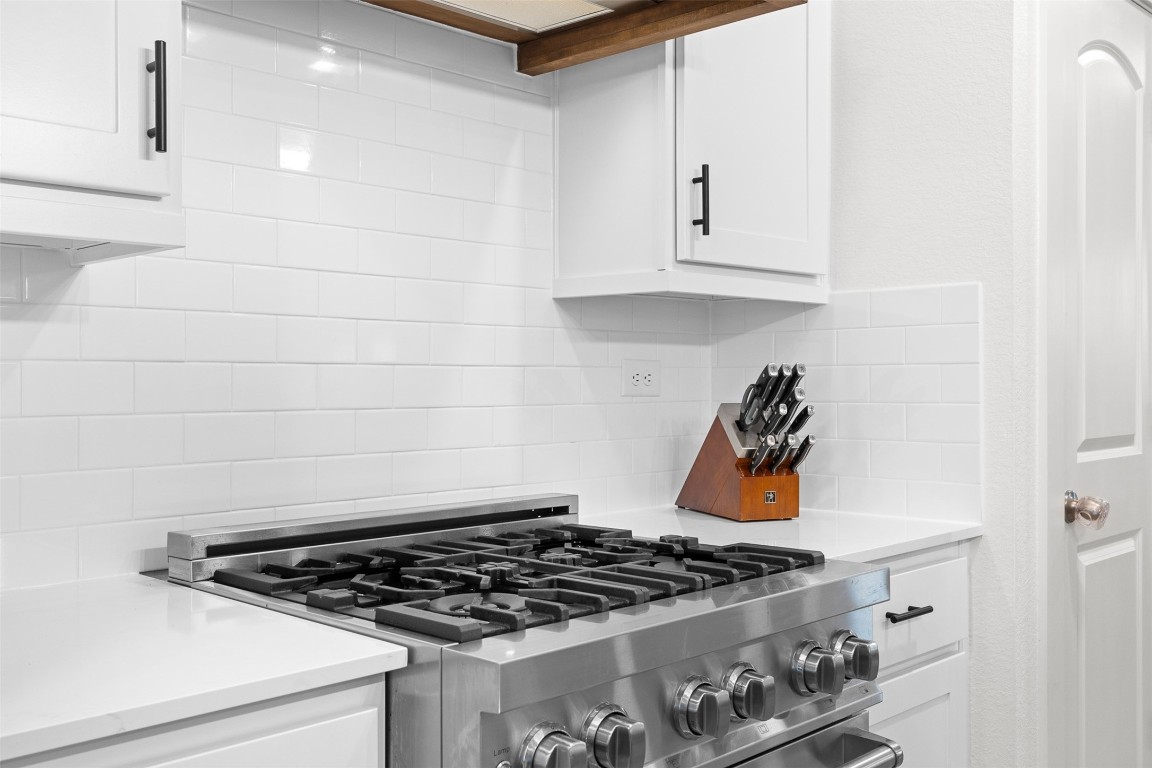 44206 Springer Road Hempstead, TX 77445 - Photo 15 of 43 a stove top oven sitting inside of a kitchen