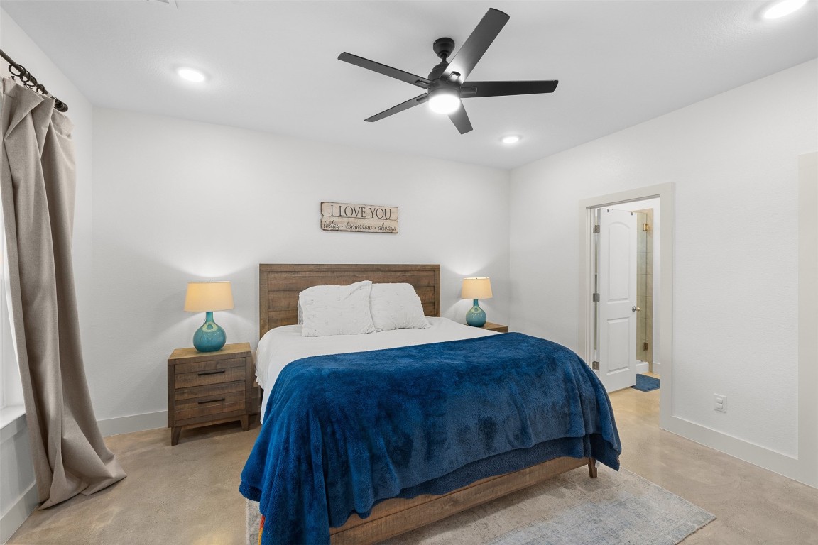 44206 Springer Road Hempstead, TX 77445 - Photo 17 of 43 a bedroom with a bed window and a wall painting