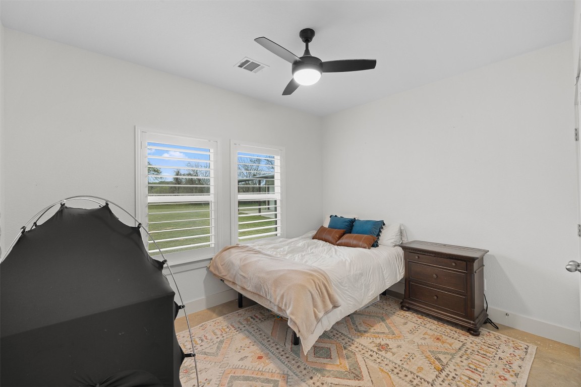 44206 Springer Road Hempstead, TX 77445 - Photo 22 of 43 a bedroom with a bed and a window