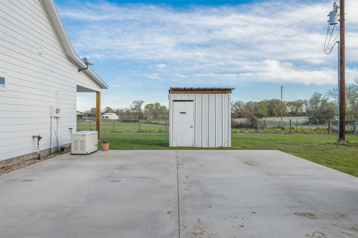 44206 Springer Road Hempstead, TX 77445 - Photo 24 of 43 a view of a house with backyard and garden
