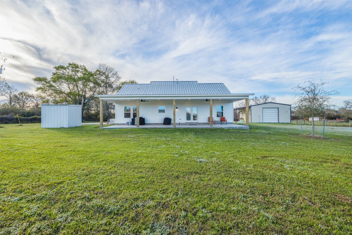 44206 Springer Road Hempstead, TX 77445 - Photo 29 of 43 a front view of house with yard barbeque and outdoor seating