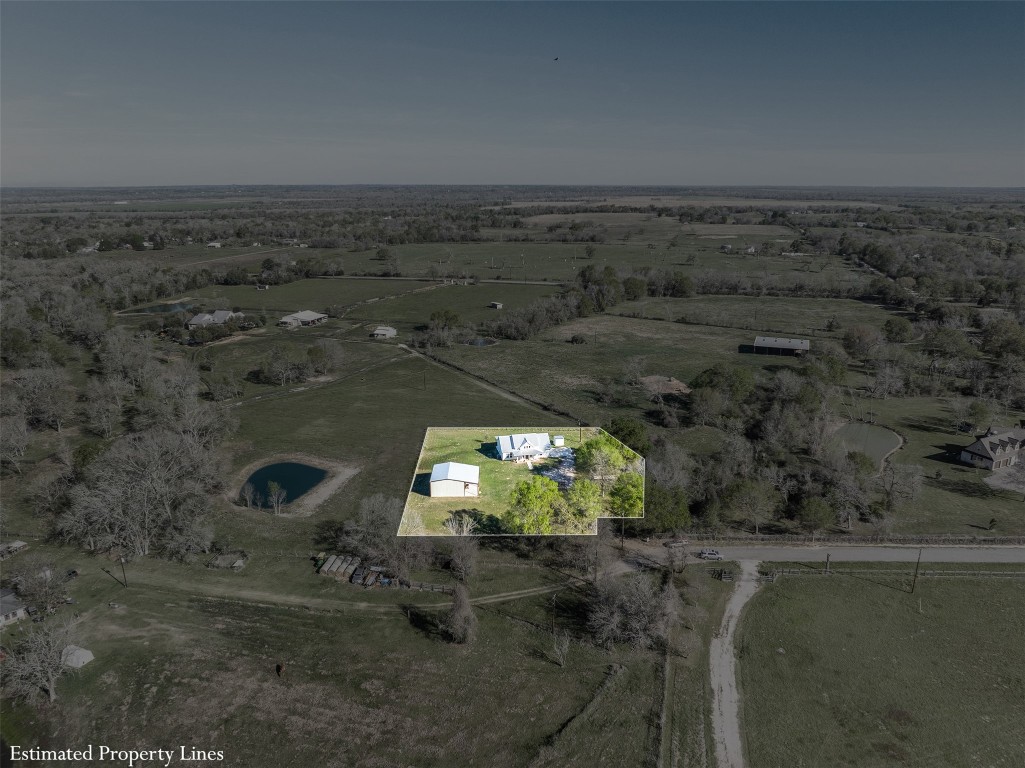 44206 Springer Road Hempstead, TX 77445 - Photo 34 of 43 an aerial view of a house with a yard