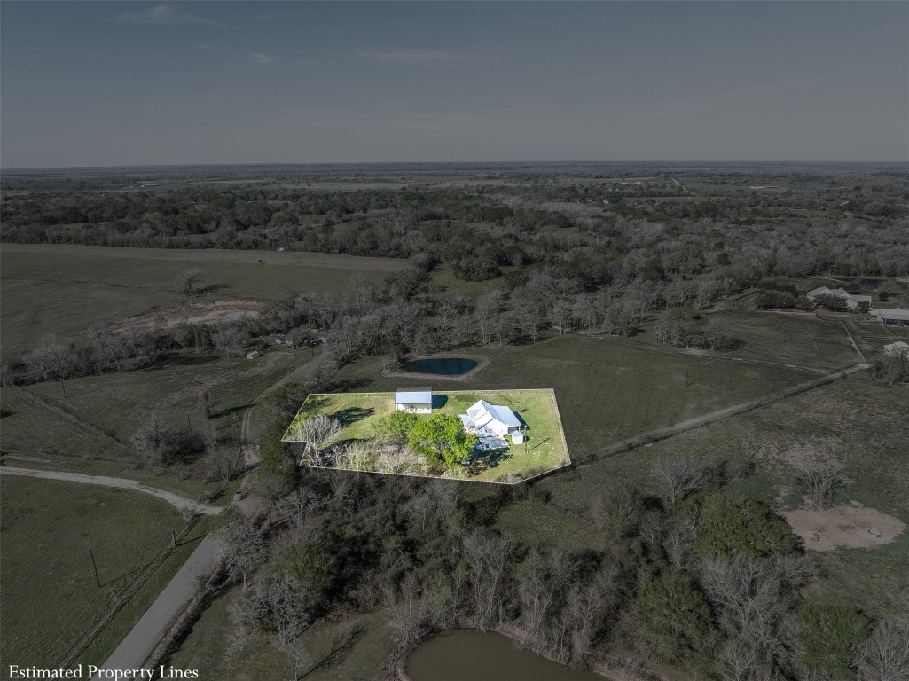 44206 Springer Road Hempstead, TX 77445 - Photo 36 of 43 an aerial view of a backyard of a house