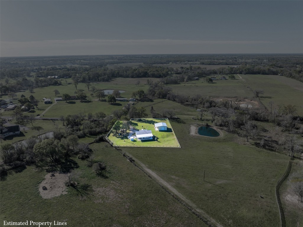 44206 Springer Road Hempstead, TX 77445 - Photo 38 of 43 an aerial view of a house with a yard