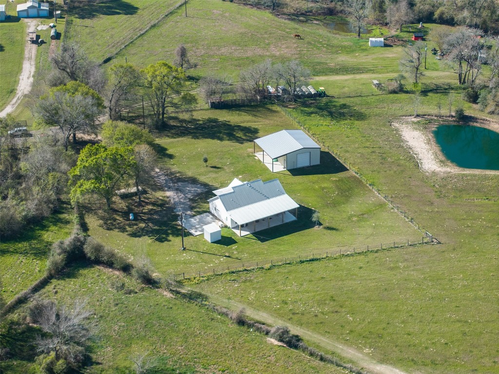 44206 Springer Road Hempstead, TX 77445 - Photo 42 of 43 an aerial view of a house with a yard