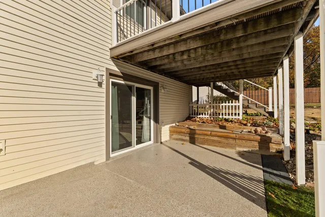 a view of a balcony and front door