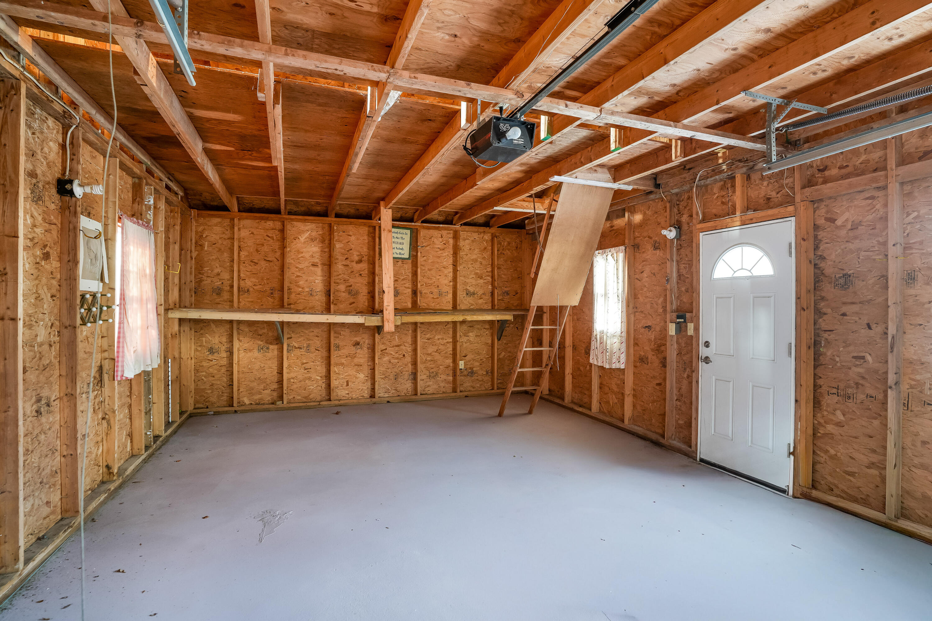 32 Norton Orchard Road Edgartown, MA 02539 - Photo 2 of 26 a view of an empty room with wooden walls