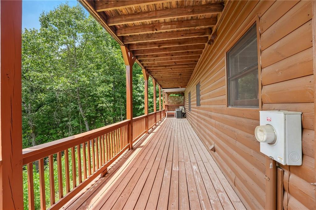 1384 Crystal Lane Northeast Ranger, GA 30734 - Photo 59 of 89 a view of balcony with wooden floor and outdoor space