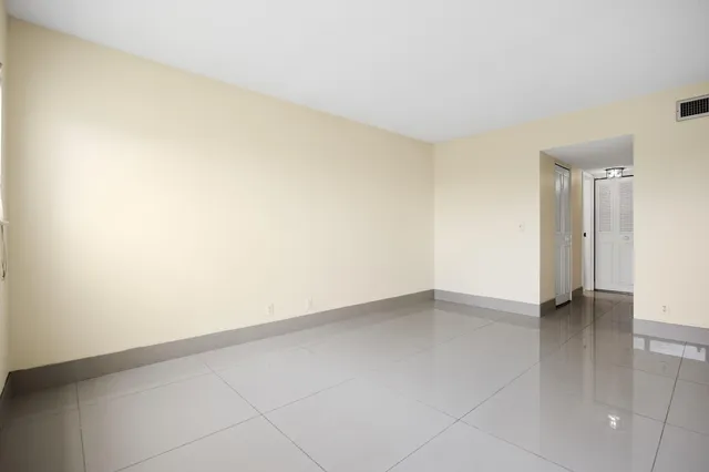 a view of a balcony with chairs