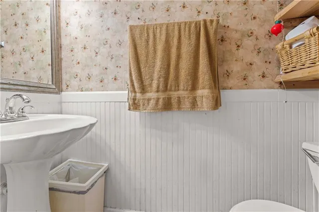 a bathroom with a sink and a toilet