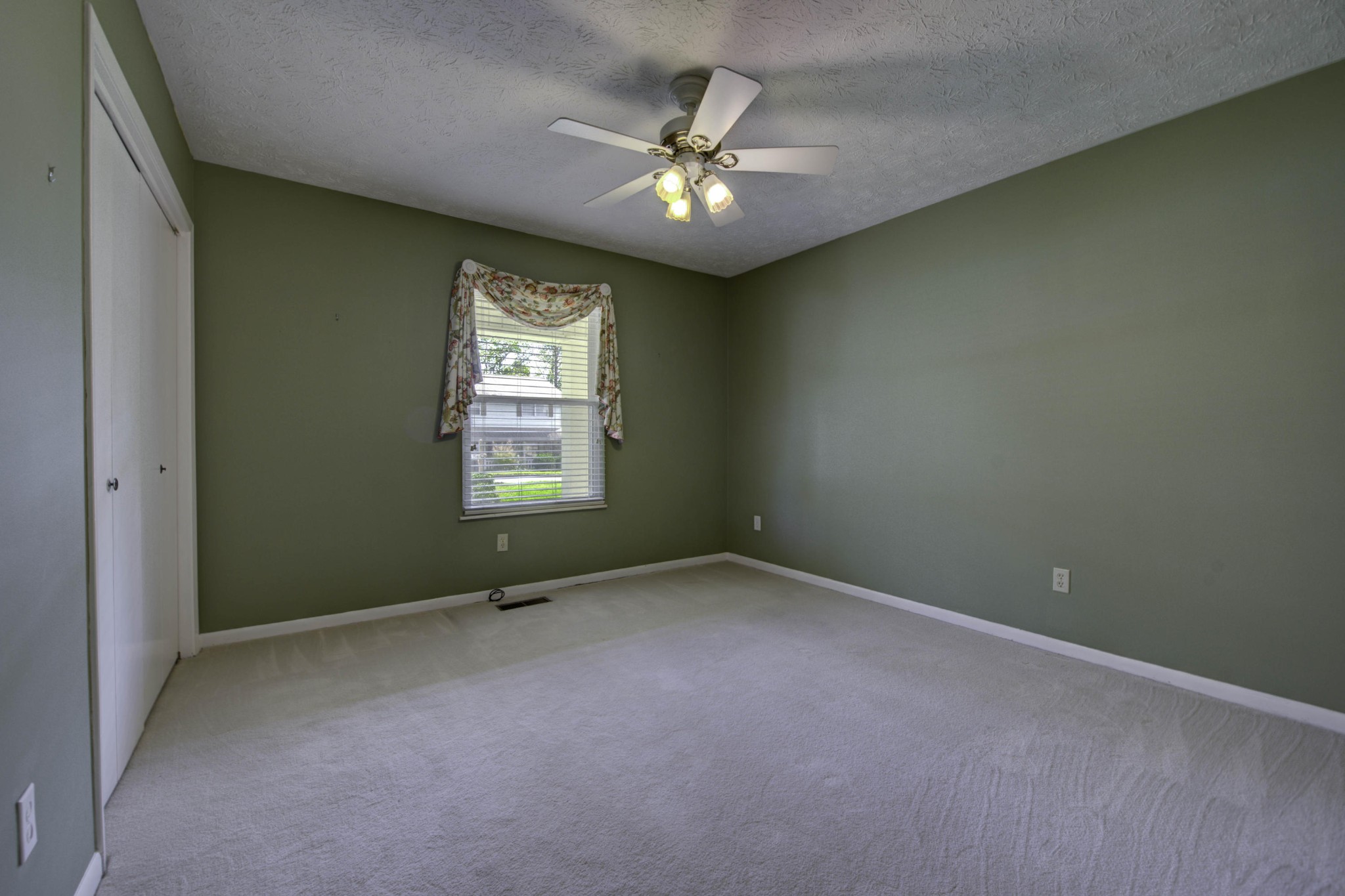 118 Garnet Lane Oak Ridge, TN 37830 - Photo 21 of 28 a view of an empty room with a window