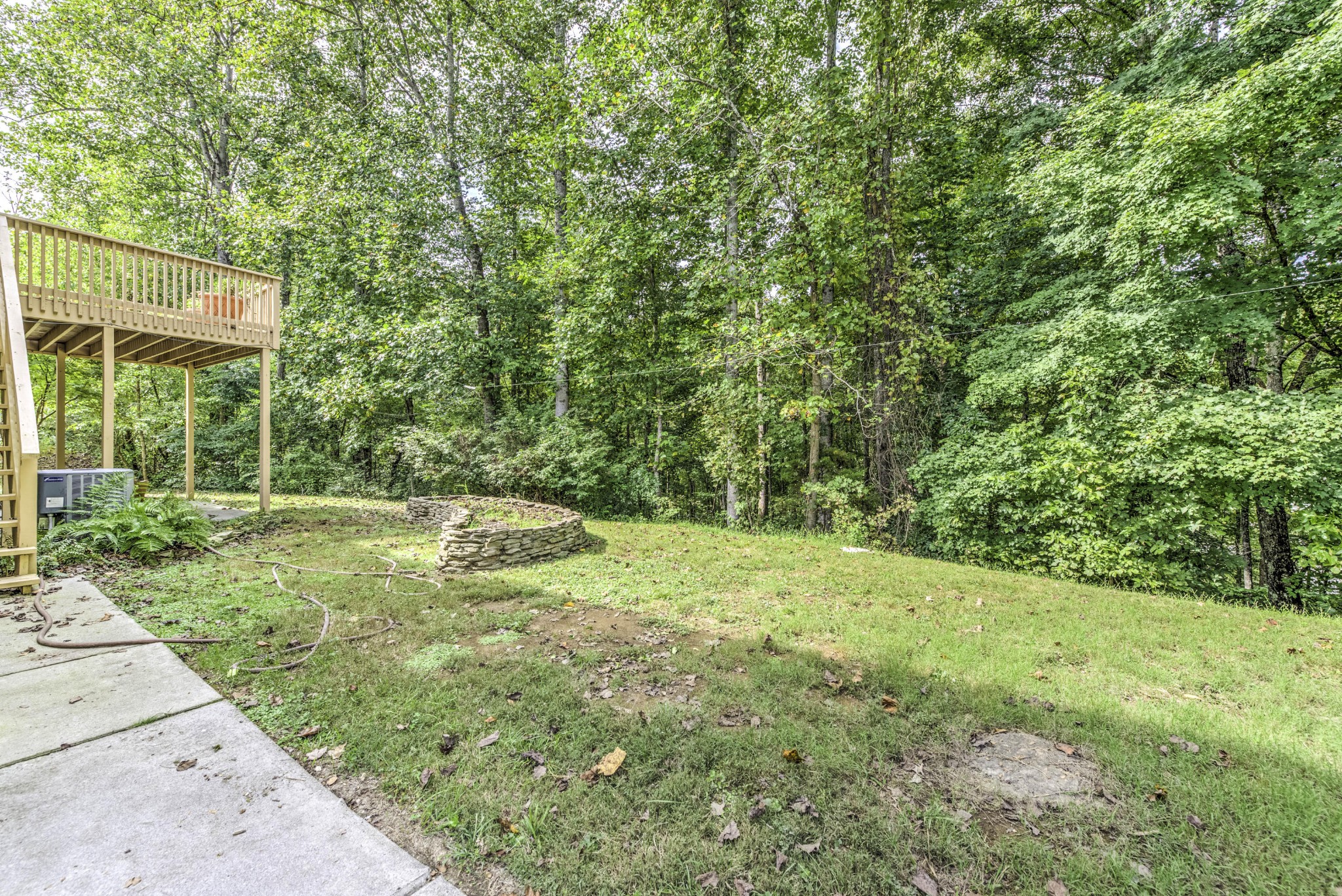 118 Garnet Lane Oak Ridge, TN 37830 - Photo 27 of 28 a view of a yard with a tree