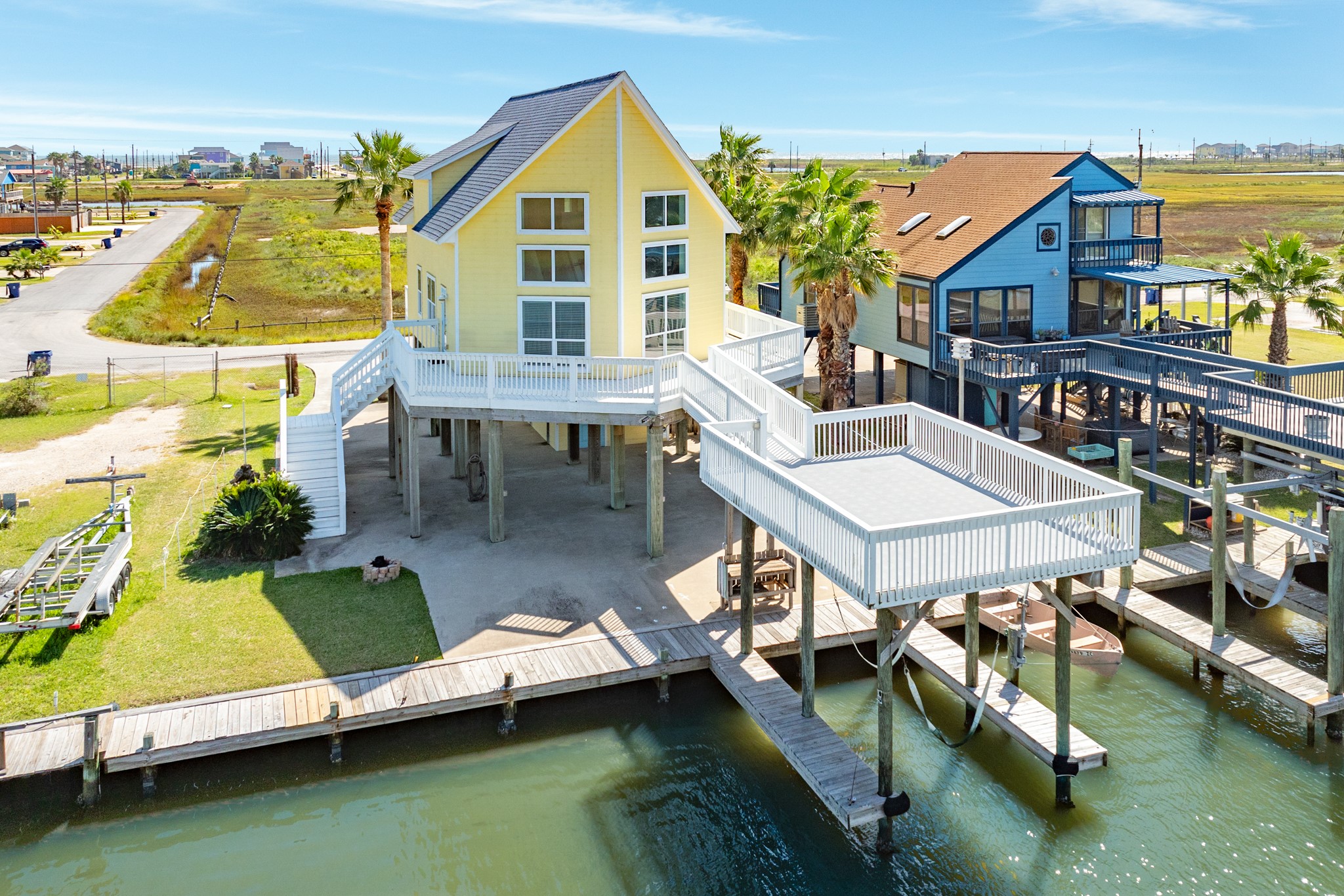 Waterfront access at its best—your private dock, boat lift, and open bay views just steps from the back door.