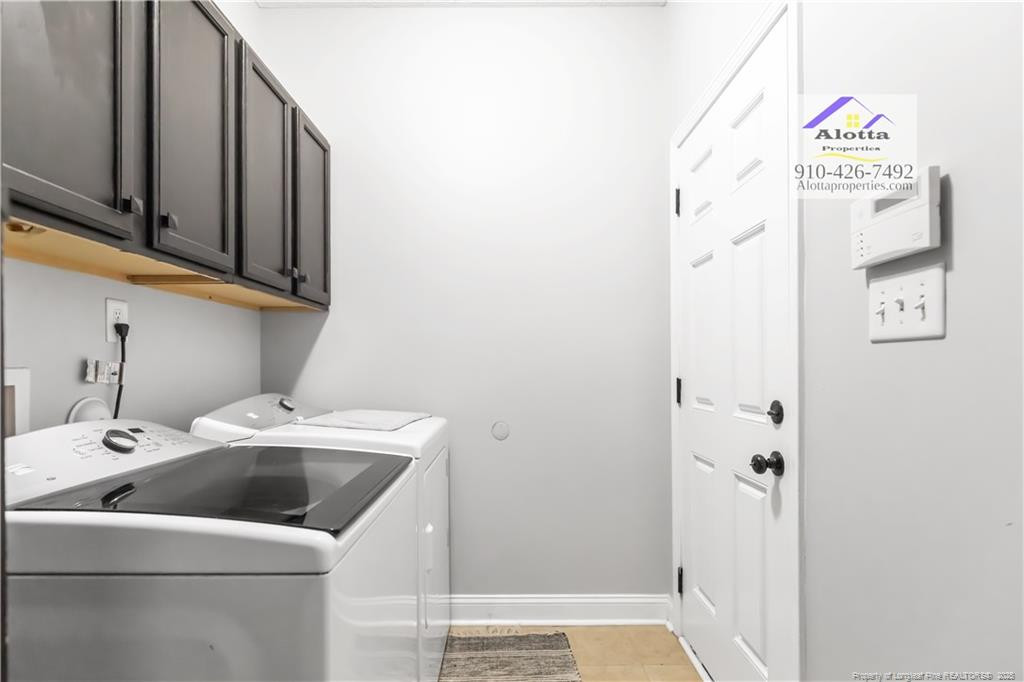 4112 Newgate Street Fayetteville, NC 28306 - Photo 13 of 32 a utility room with dryer and washer
