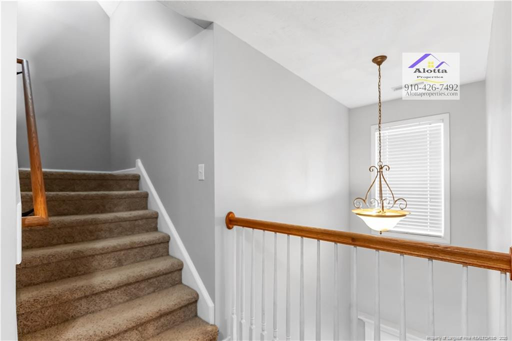 4112 Newgate Street Fayetteville, NC 28306 - Photo 19 of 32 a view of a staircase