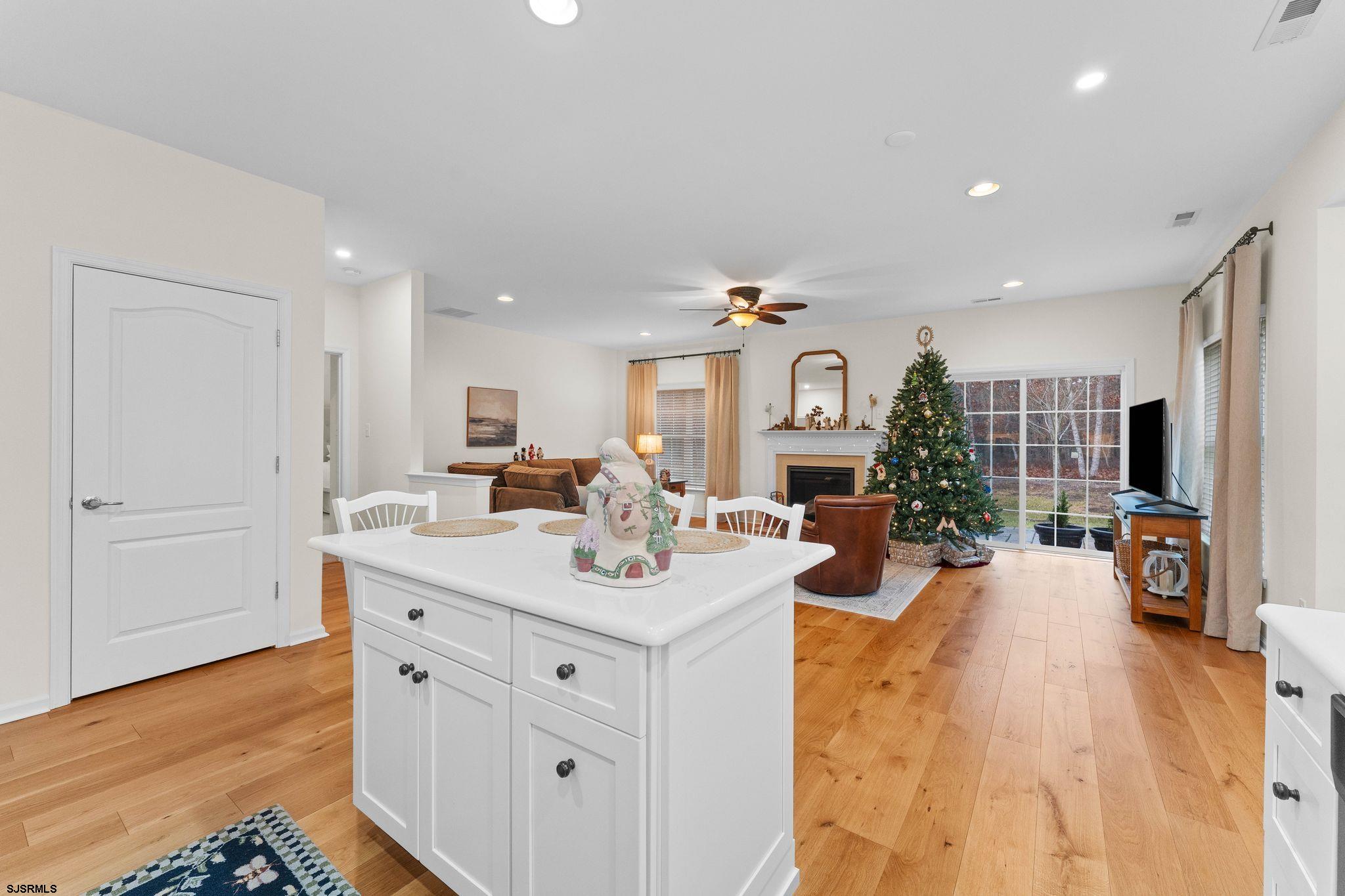 11 Daffodil Road Egg Harbor Township, NJ 08234 - Photo 11 of 50 a view of a kitchen counter top space with furniture and wooden floor