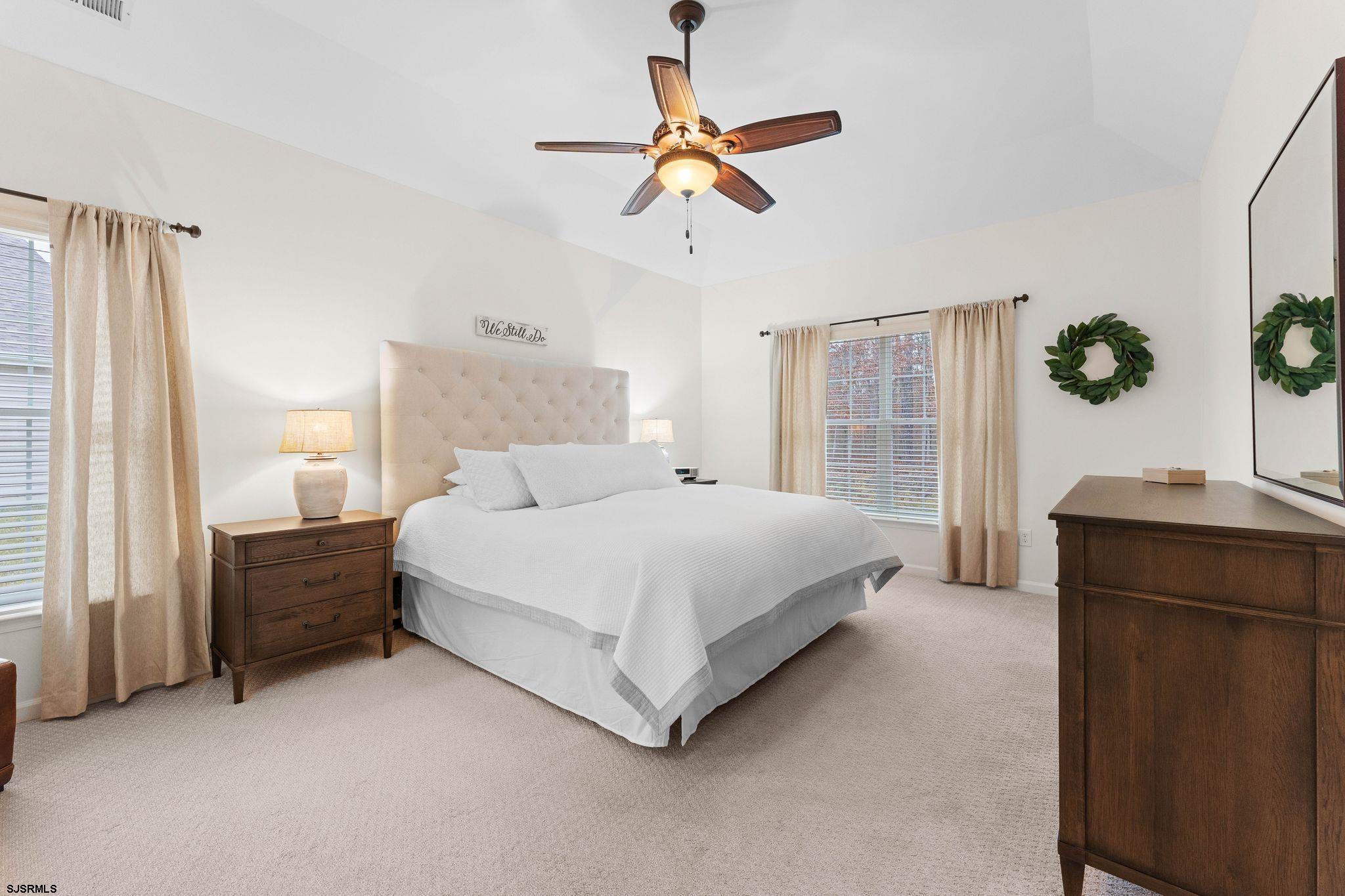 11 Daffodil Road Egg Harbor Township, NJ 08234 - Photo 18 of 50 a spacious bedroom with a bed and a window