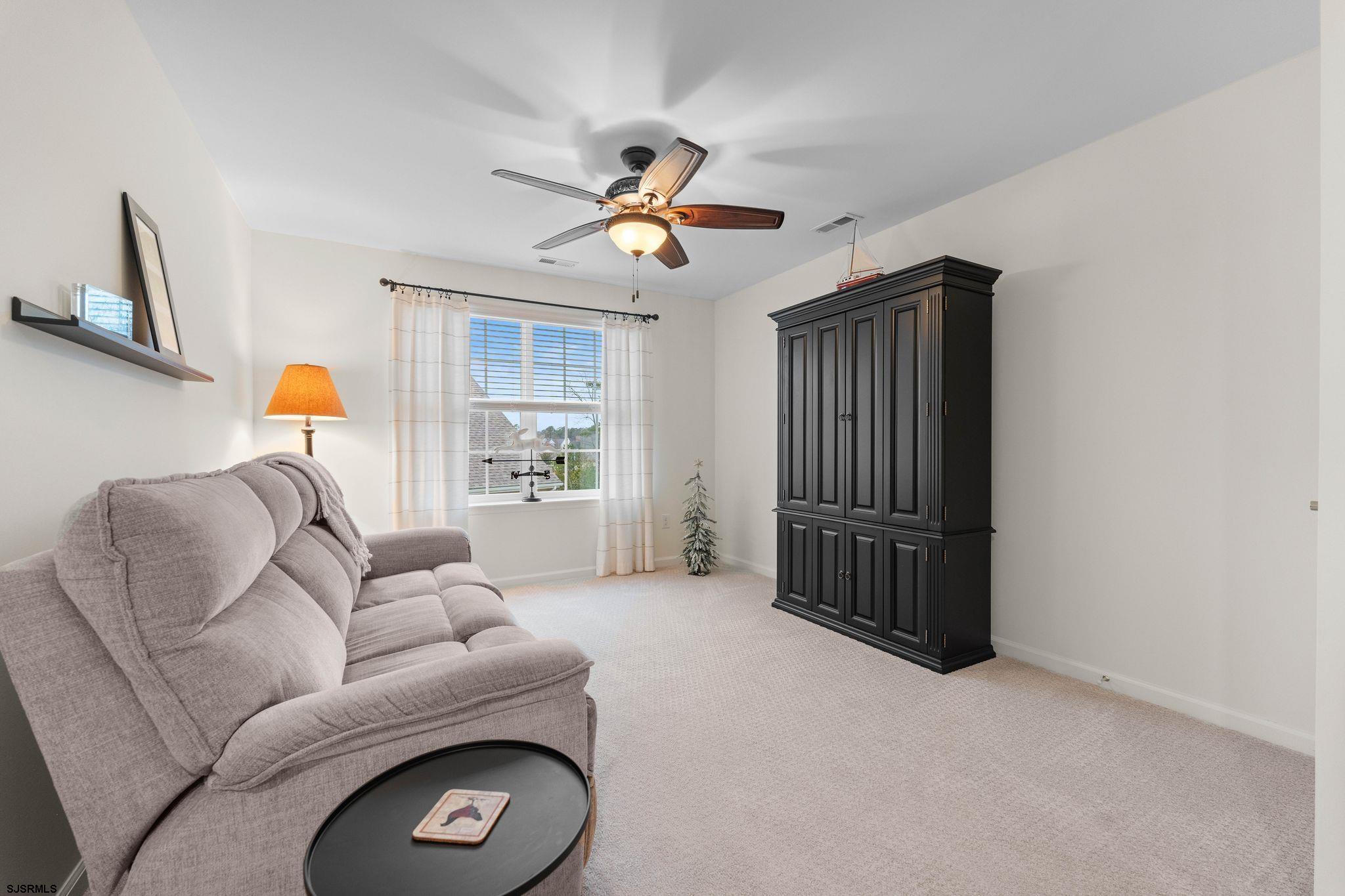 11 Daffodil Road Egg Harbor Township, NJ 08234 - Photo 26 of 50 a living room with furniture and a window