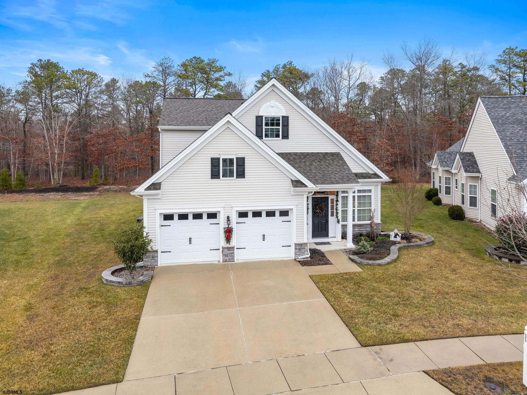 11 Daffodil Road Egg Harbor Township, NJ 08234 - Photo 40 of 50 a view of a white house with a outdoor space