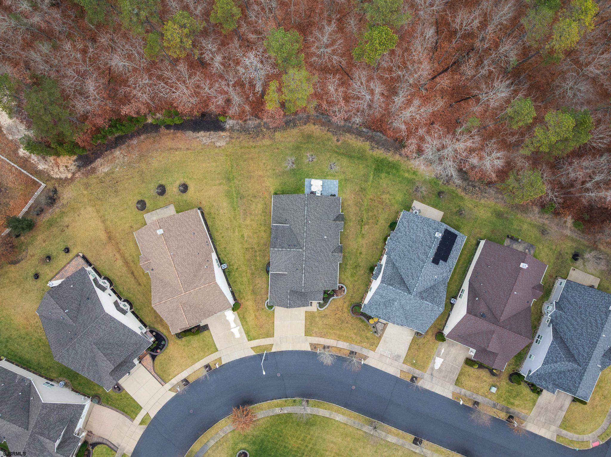 11 Daffodil Road Egg Harbor Township, NJ 08234 - Photo 42 of 50 an aerial view of a house with outdoor space swimming pool and mountains