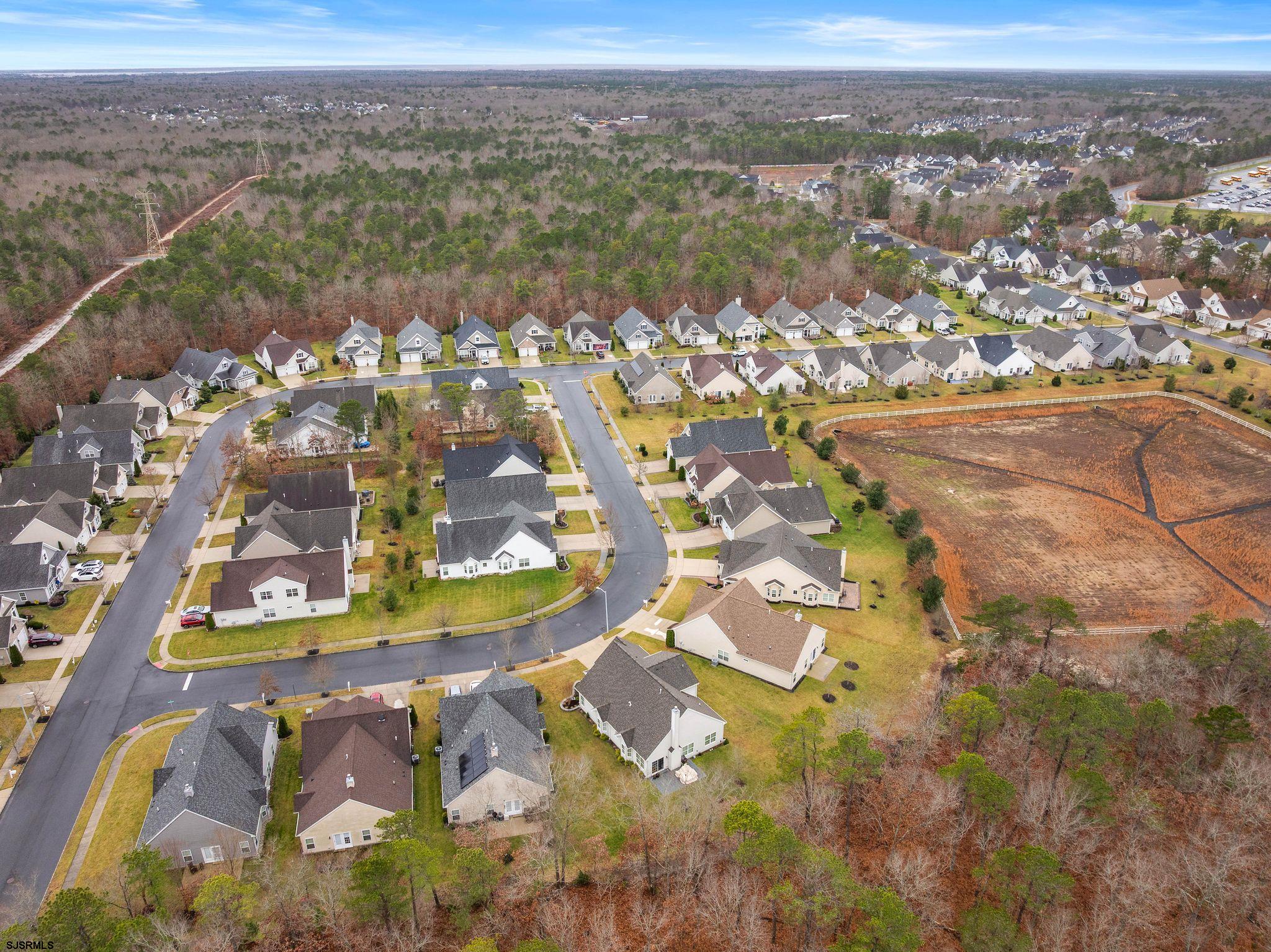 11 Daffodil Road Egg Harbor Township, NJ 08234 - Photo 46 of 50 an aerial view of residential houses with outdoor space