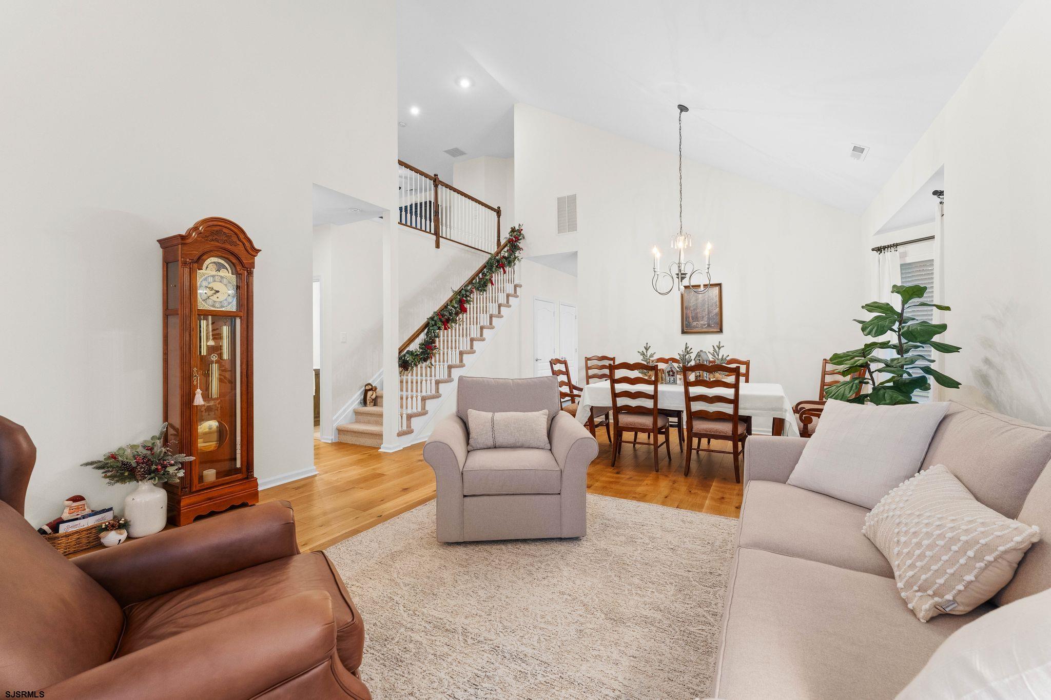 11 Daffodil Road Egg Harbor Township, NJ 08234 - Photo 6 of 50 a living room with furniture a fireplace and a potted plant