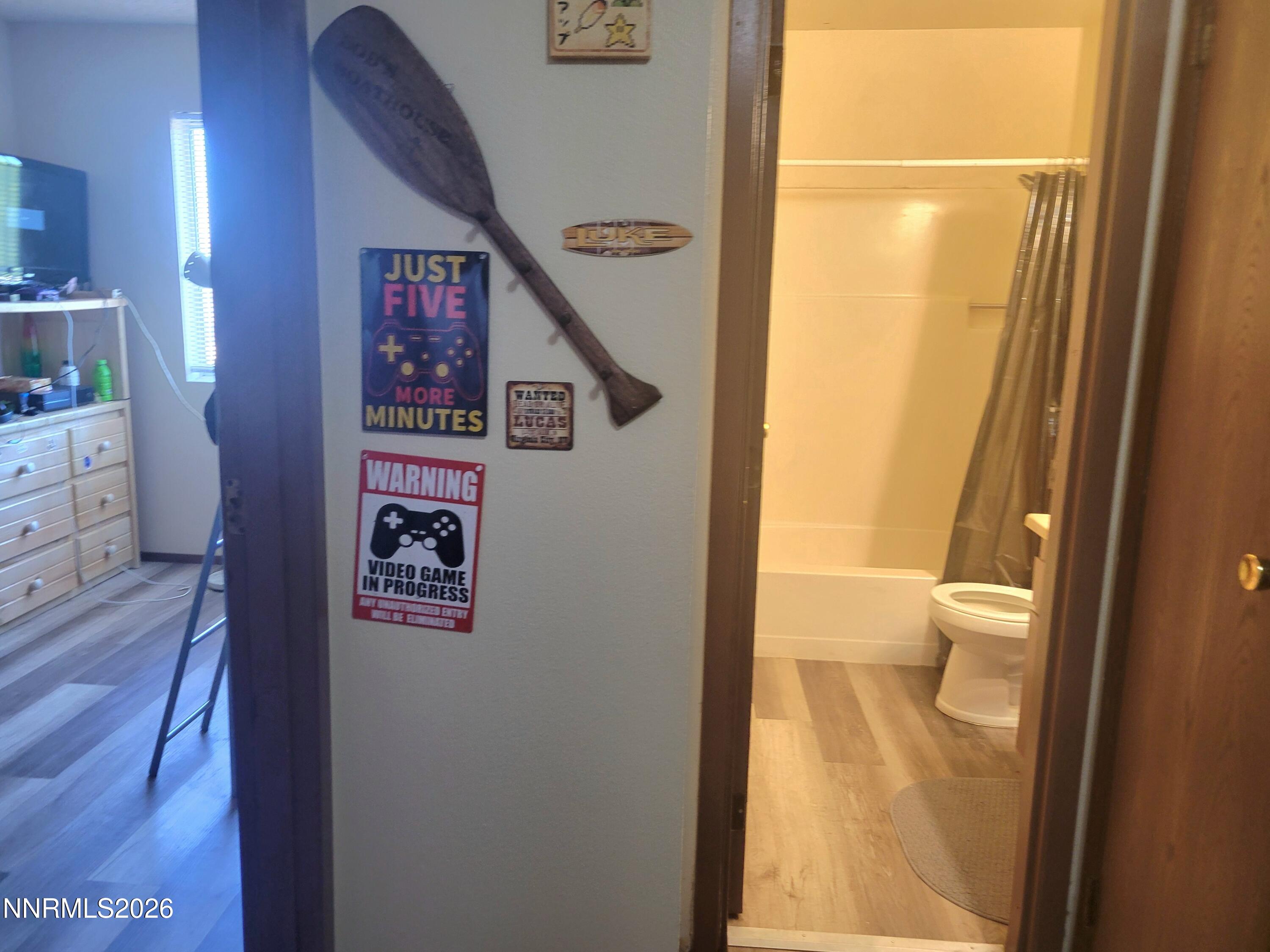 1404 East 9th Street, Unit 3 Reno, NV 89512 - Photo 26 of 29 a bathroom with a toilet and a sink
